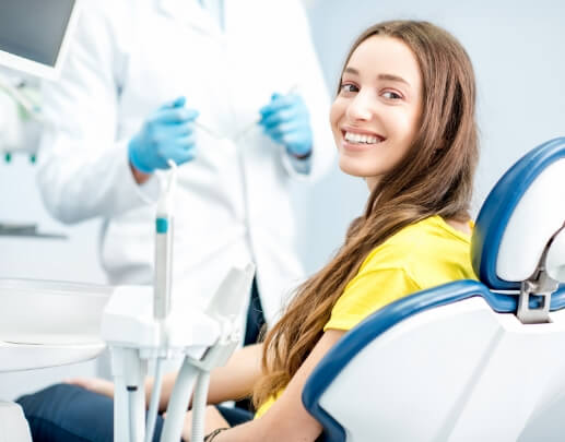 Smiling woman in dental chair