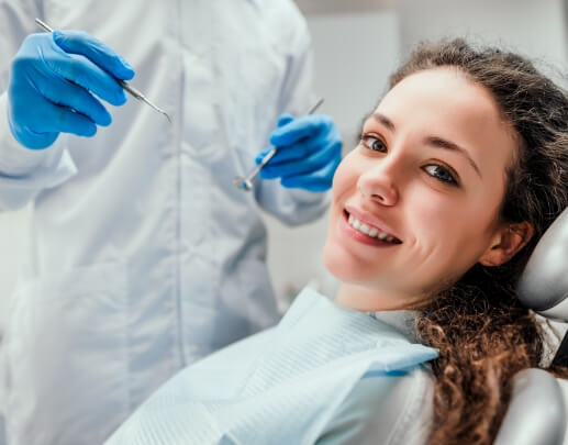 Woman smiling during dental checkup