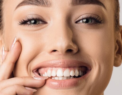 Closeup of patient smiling after gum recontouring