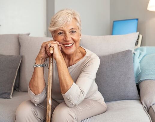 Woman with dentures smiling