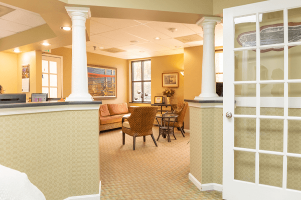 Doorway looking from dental treatment area into dental office waiting room